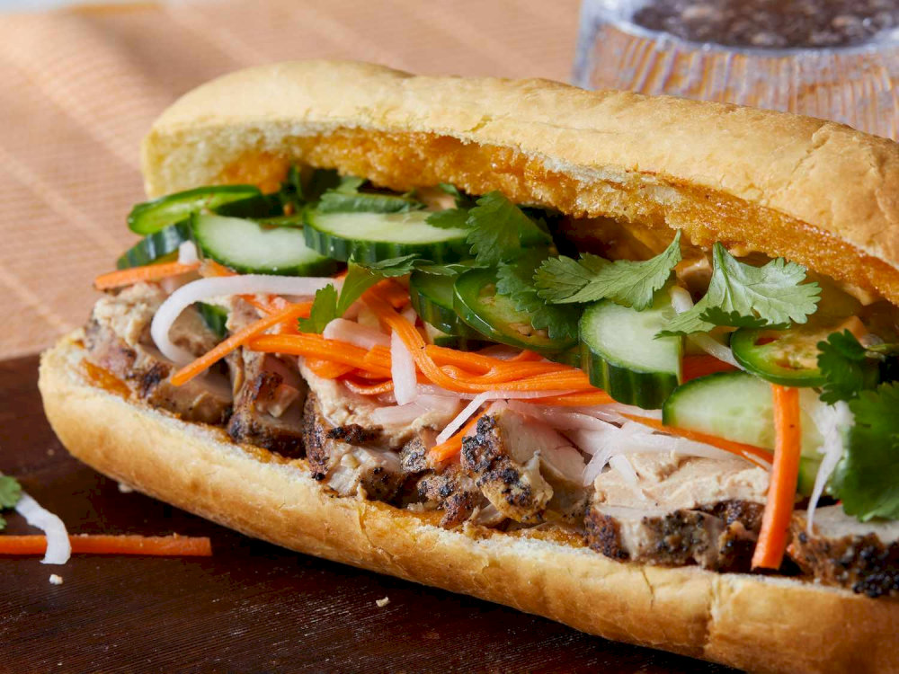 A mouthwatering banh mi with soft crunchy veggies and a burst of bold flavors